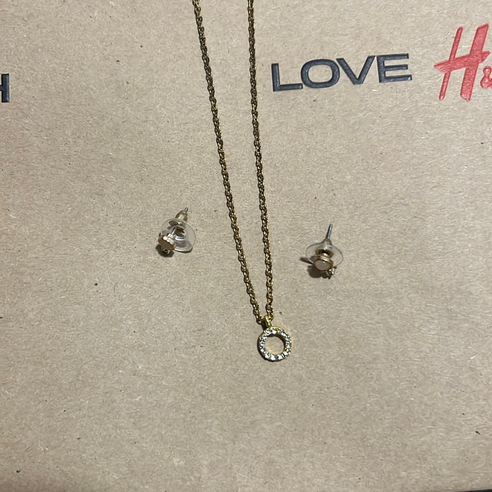 Gold toned earrings and necklace
